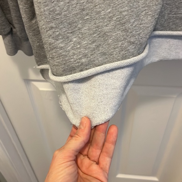 Cute gray sweatshirt! Very comfy! A little longer in the back. - Picture 2 of 5